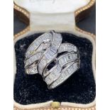 Platinum Ring set with 2.00 cts baguette diamonds Approximately 14 g