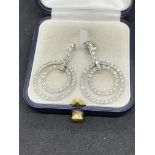 18 carat gold hoop earrings set with white stones