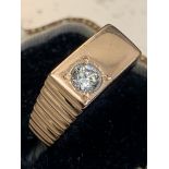 Single diamond set ring in rose colour metal approximately 0.40 cts