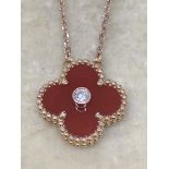 18 carat rose gold Diamond set pendant and chain marked VCA 750