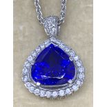 18 carat gold 7ct Tanzanite and one carat diamond heart pendant and chain Approximately 19.4 g