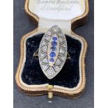 Gold and silver sapphire and diamond ring