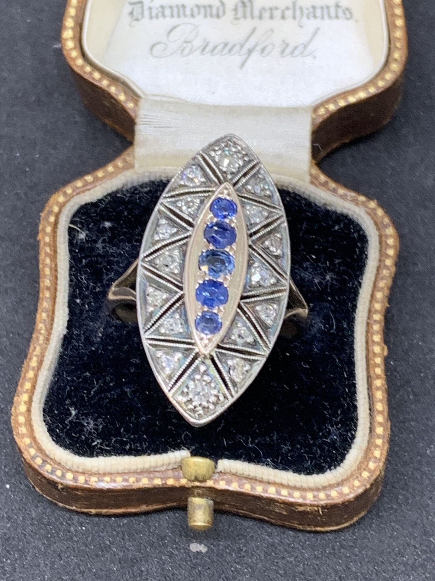 Gold and silver sapphire and diamond ring