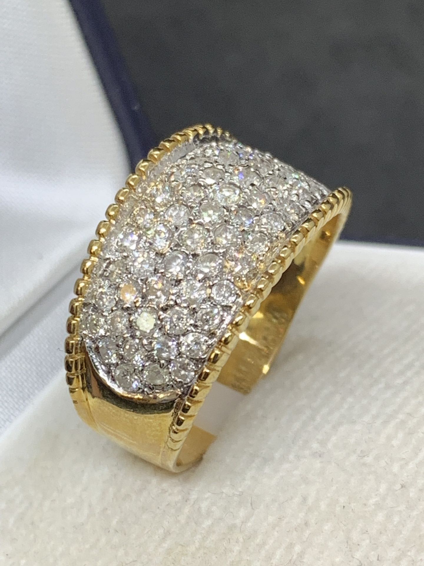 14 carat gold ring set with approximately 1.8 carats of diamonds Approximately 6.7 g