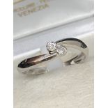 18 carat white gold ring set with two diamonds