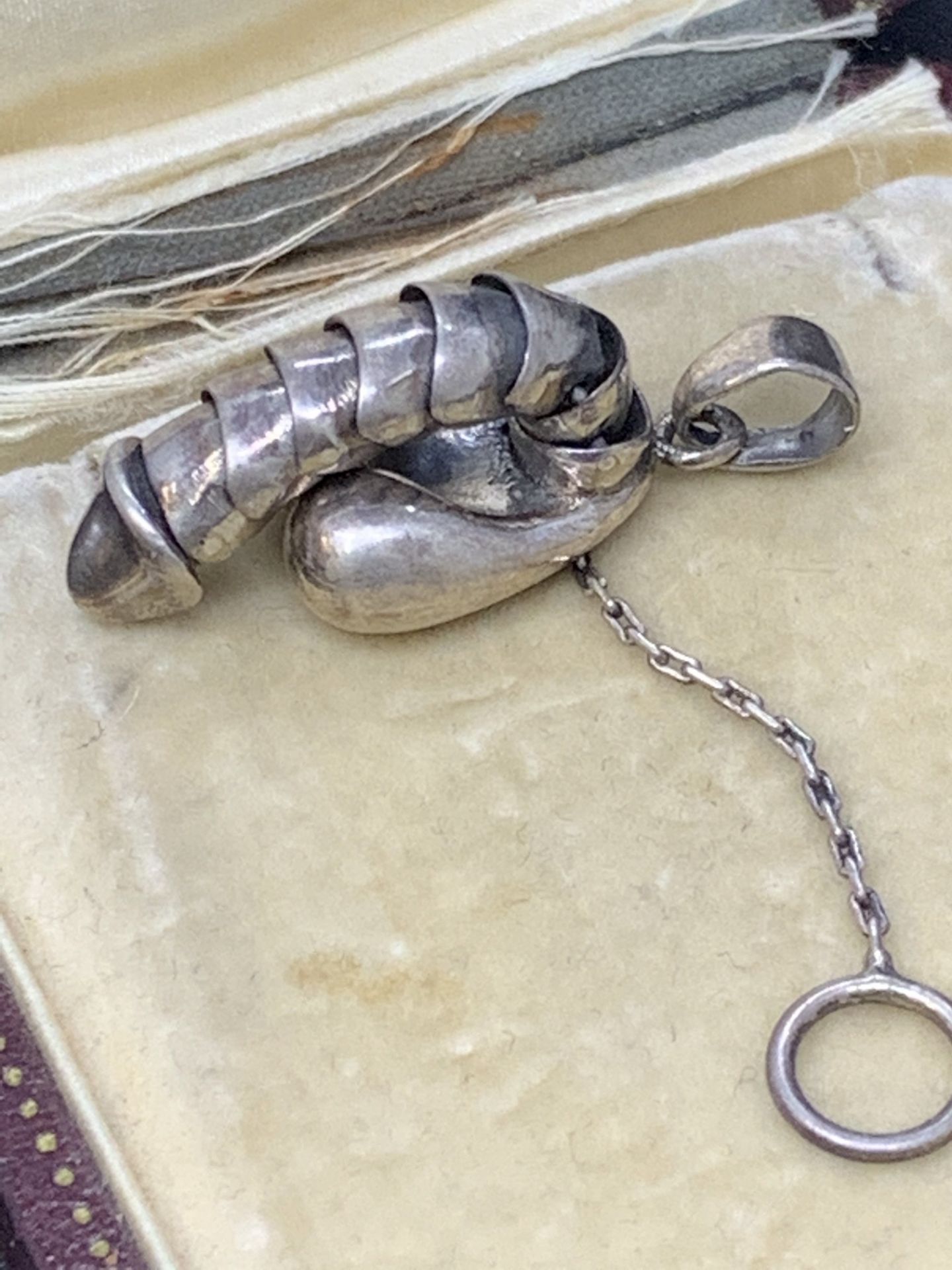 Unusual penis pendant set with pull cord marked 925 for silver