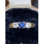 Sapphire and diamond Ring set in yellow metal tested as 18 carat gold