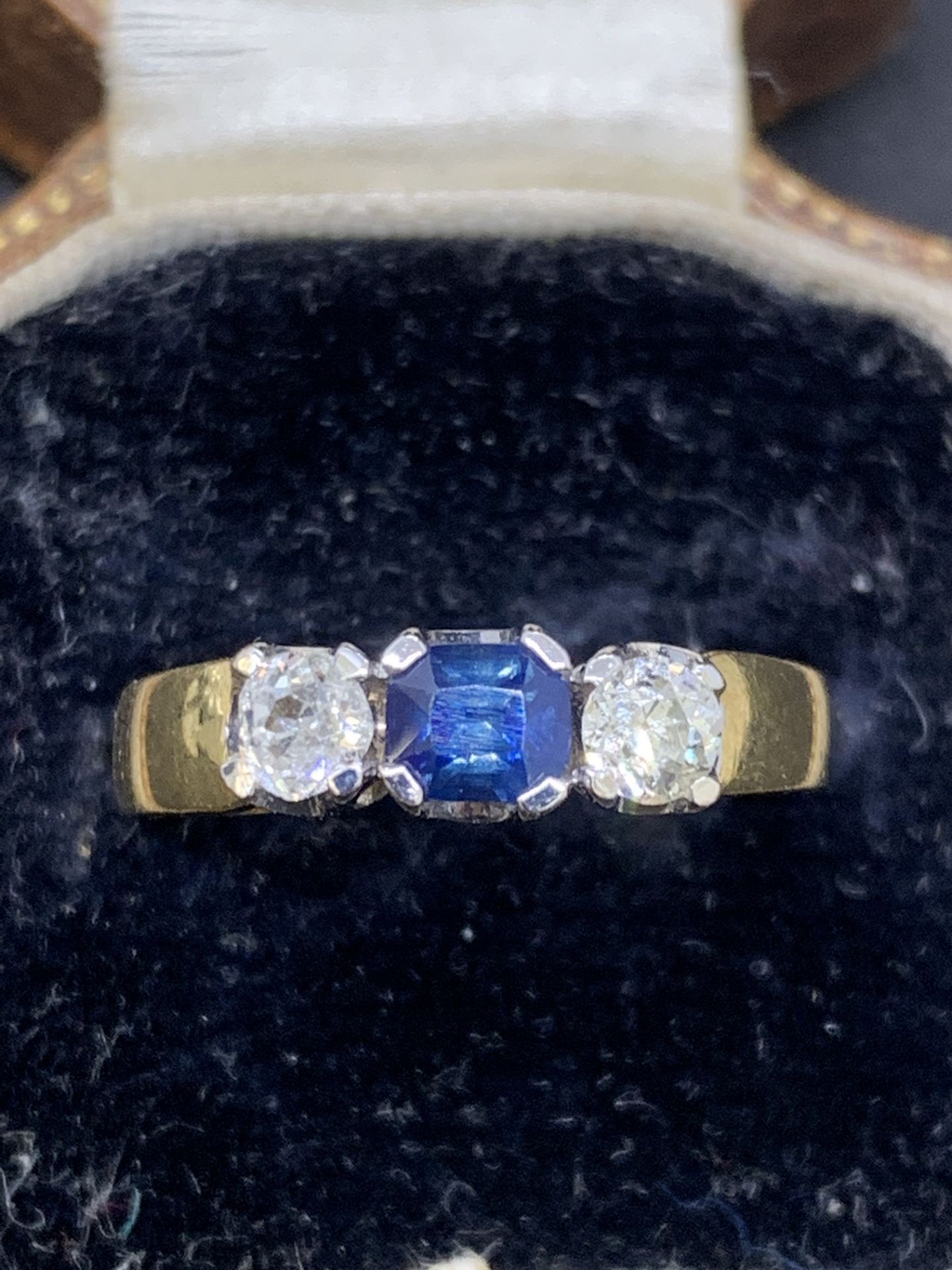 Sapphire and diamond Ring set in yellow metal tested as 18 carat gold