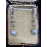 18 carat white gold diamond set discs on a pearl drop earrings Approx 2" Long