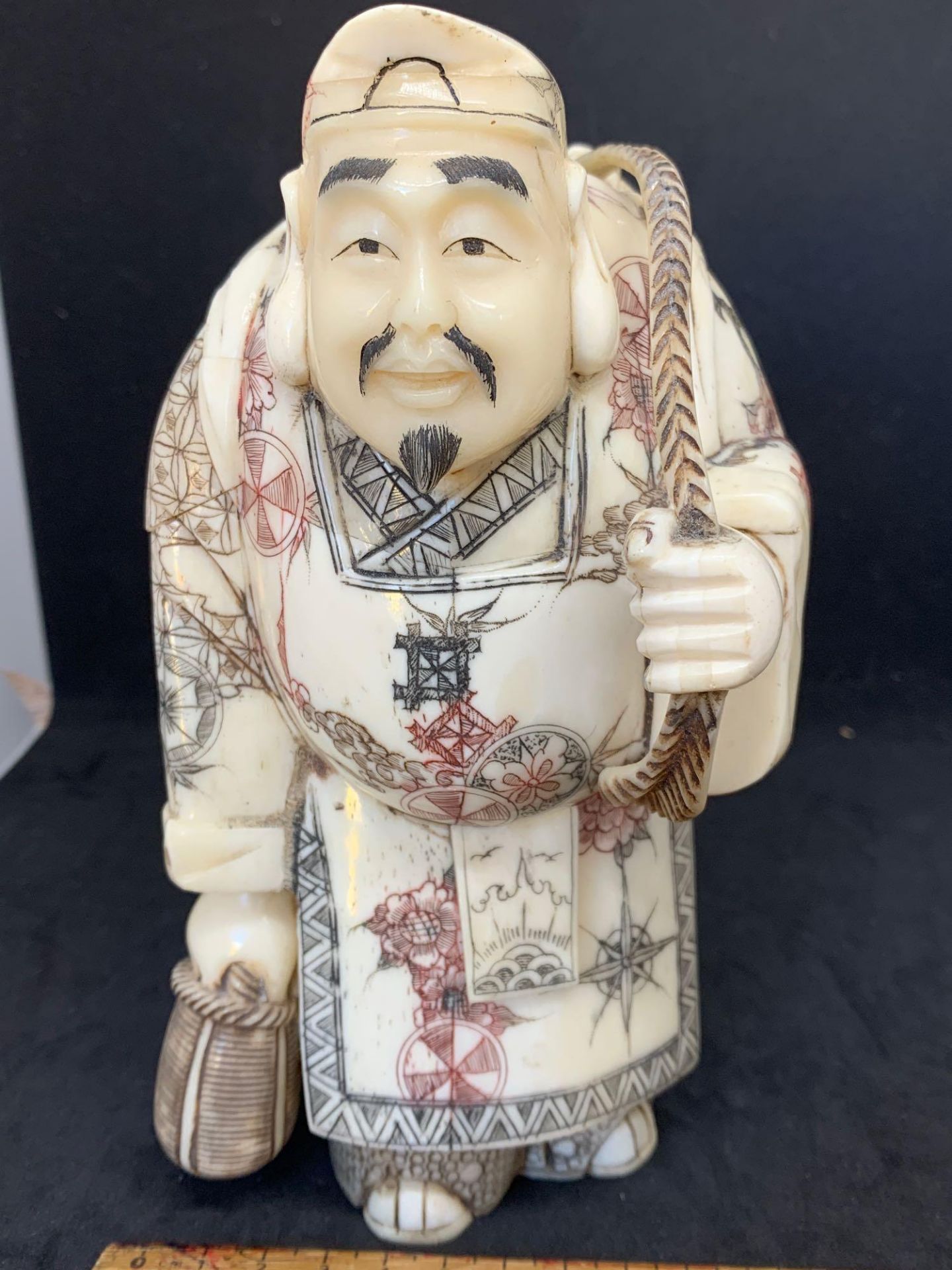 Chinese or Japanese looking figure of a man carrying fish signed on the bottom - Image 2 of 7