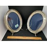 Pair of matching oval frames tested as silver