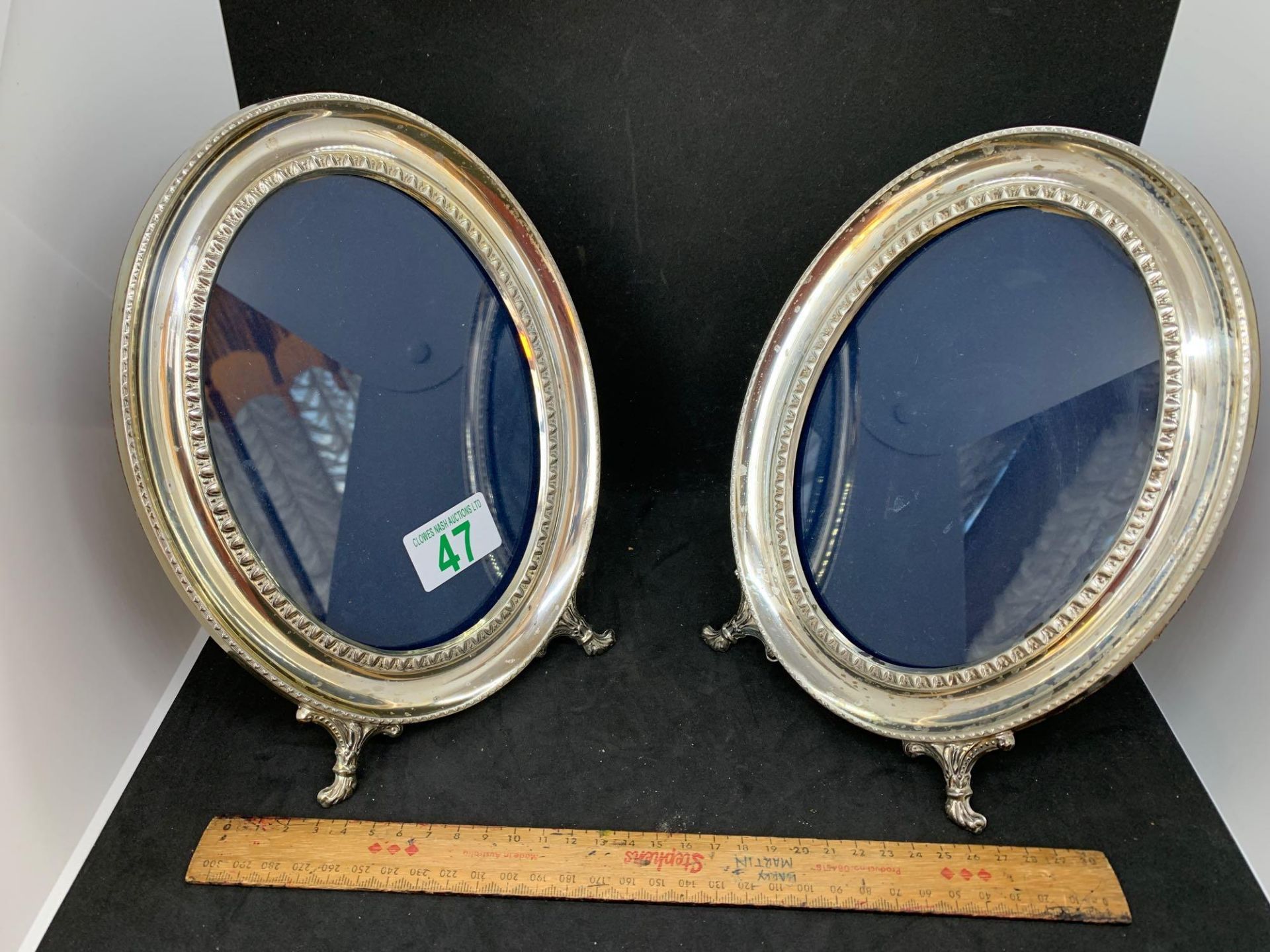 Pair of matching oval frames tested as silver