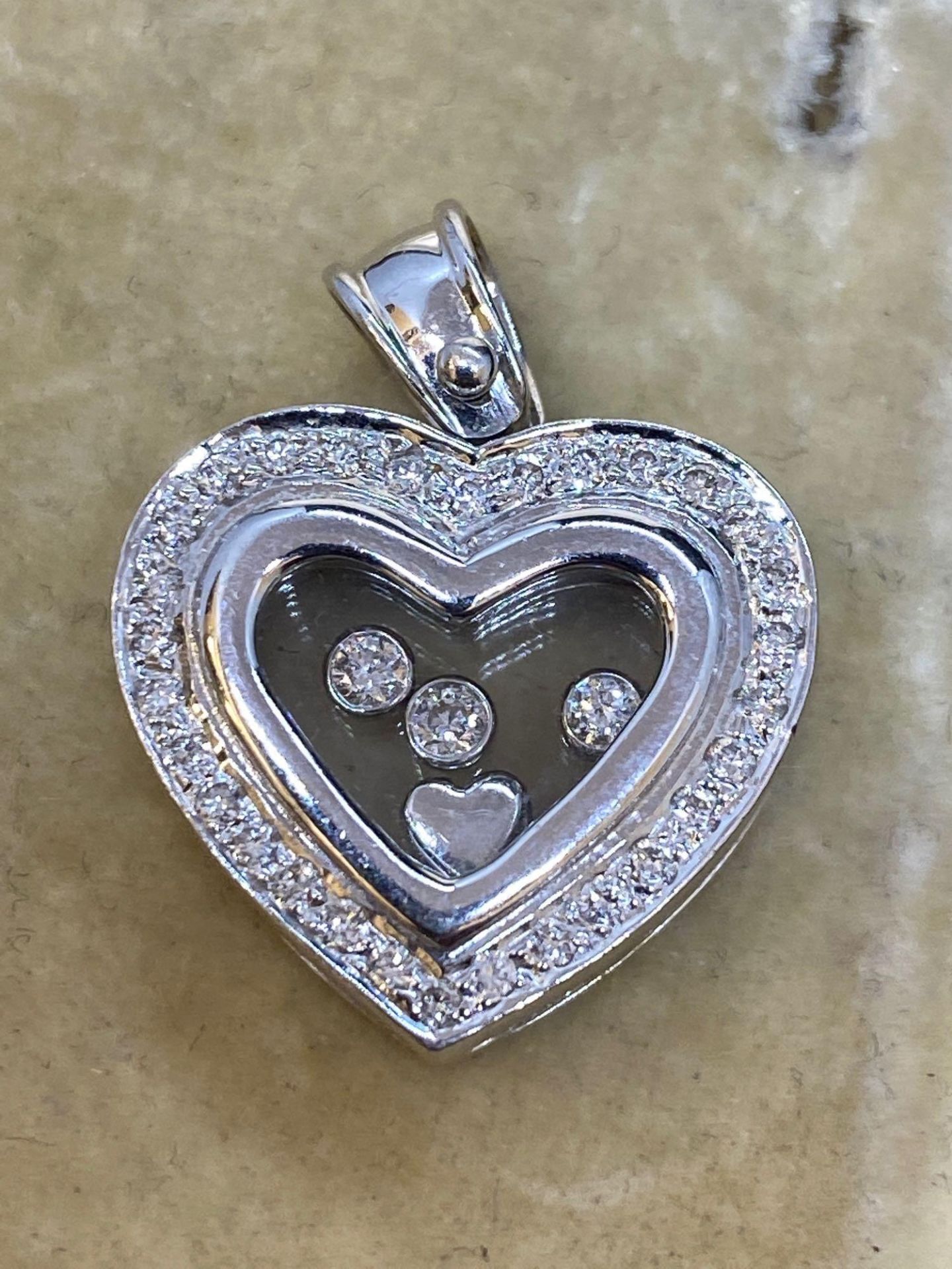 18ct While Gold Diamond set Heart Pendant