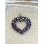 VINTAGE YELLOW METAL HEART SHAPED GARNET PENDANT