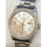 36mm STAINLESS STEEL ROLEX SET WITH AFTERMARKET DIAMONDS / DIAL