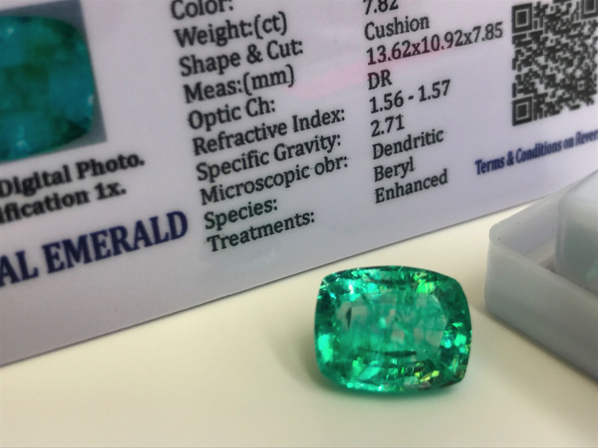 GREEN STONE WITH CARD MARKED EMERALD