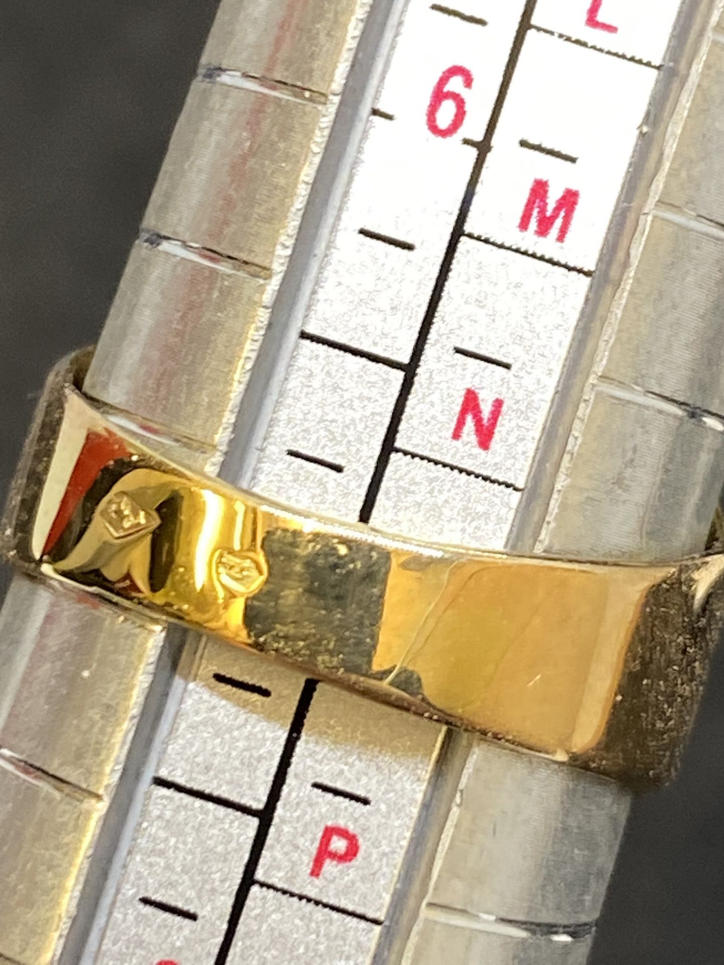 YELLOW METAL CHINESE WRITING WITH 0.60ct G/VS DIAMOND SET RING - TESTED AS 18ct GOLD - 9 GRAMS - Image 5 of 5