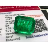 GREEN STONE WITH CARD MARKED EMERALD