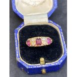 Antique Diamond & Ruby set Ring Rose coloured metal tested as 18ct Rose Gold