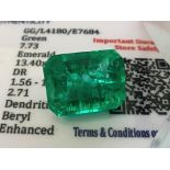 GREEN STONE WITH CARD MARKED EMERALD