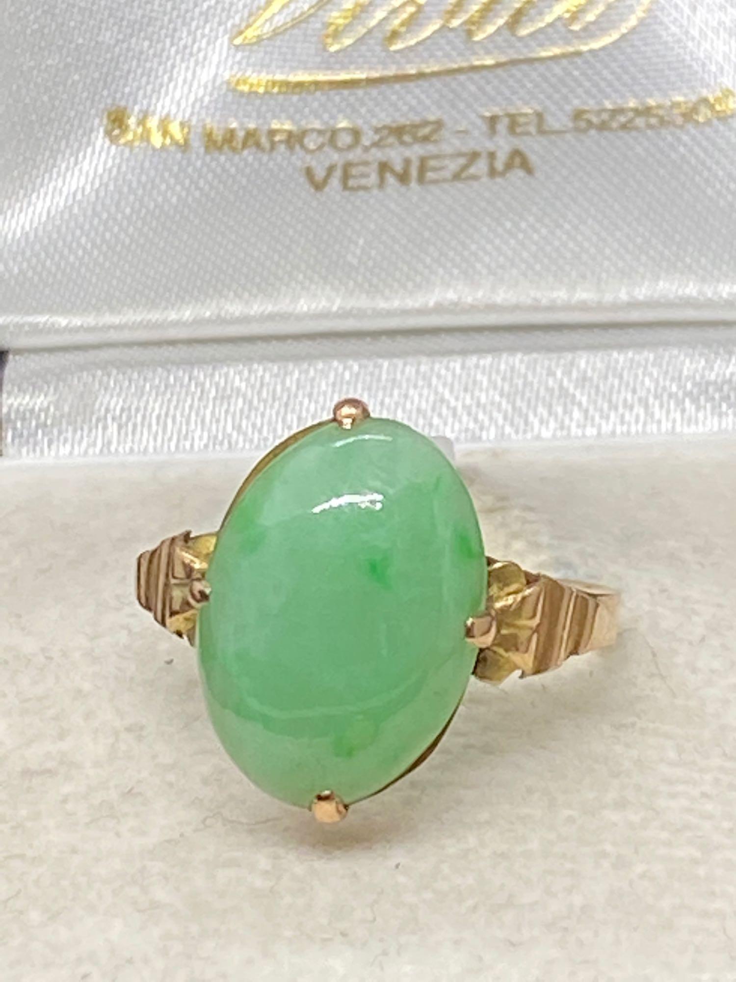 Yellow Coloured Metal Ring Set with Jade, hallmarked with Arabic Writing and 50%