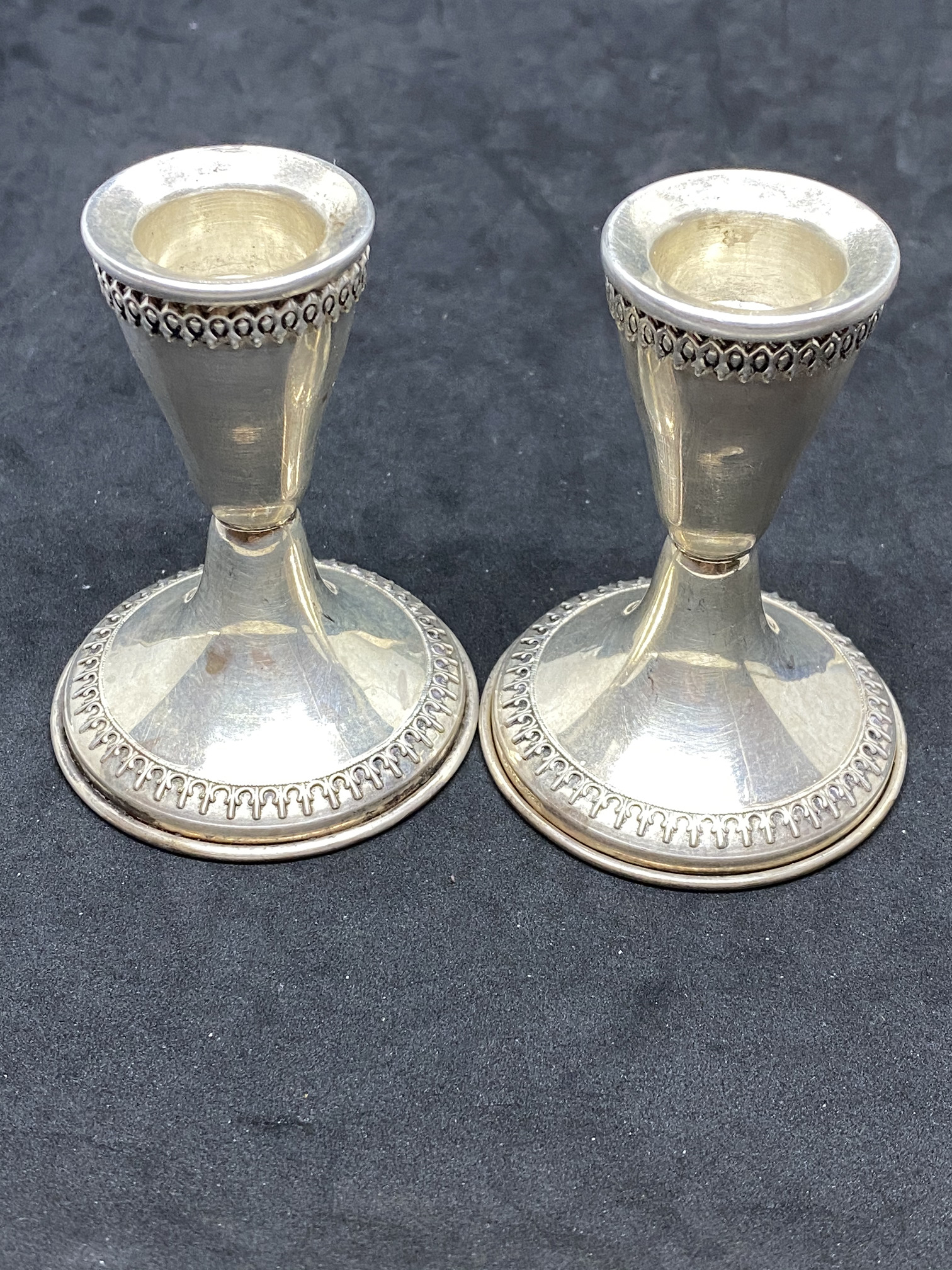 PAIR OF CANDLESTICKS TESTED AS SILVER