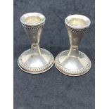 PAIR OF CANDLESTICKS TESTED AS SILVER