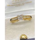 18 carat gold diamond ring set with 0.4 carats of diamonds approximately 3.5g - Approx Size N