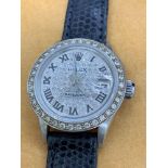 Ladies stainless steel Rolex set with aftermarket diamond dial and diamond bezel 26mm