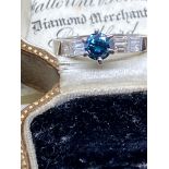 14k White Gold Blue Diamond Solitaire with Diamonds Either Side