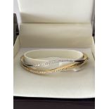 18ct GOLD DIAMOND SET HINGED BANGLE