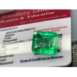 GREEN STONE WITH CARD MARKED EMERALD