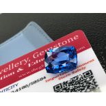 BLUE STONE WITH CARD MARKED SAPPHIRE