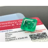 GREEN STONE WITH CARD MARKED EMERALD