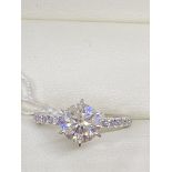 18ct WHITE GOLD 1.91ct DIAMOND SOLITAIRE RING WITH 0.35ct SIDE DIAMONDS