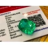 GREEN STONE WITH CARD MARKED EMERALD