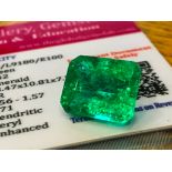 GREEN STONE WITH CARD MARKED EMERALD