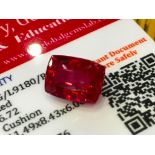 RED STONE WITH CARD MARKED RUBY