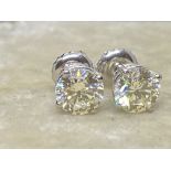 1.54ct DIAMOND SOLITAIRE EARRINGS SET IN 14ct WHITE GOLD