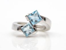 Ring in 750 white gold with 2 blue topazes, total approx. 3.2 ct.Weight 8,2 g, size 54Ring aus 750er