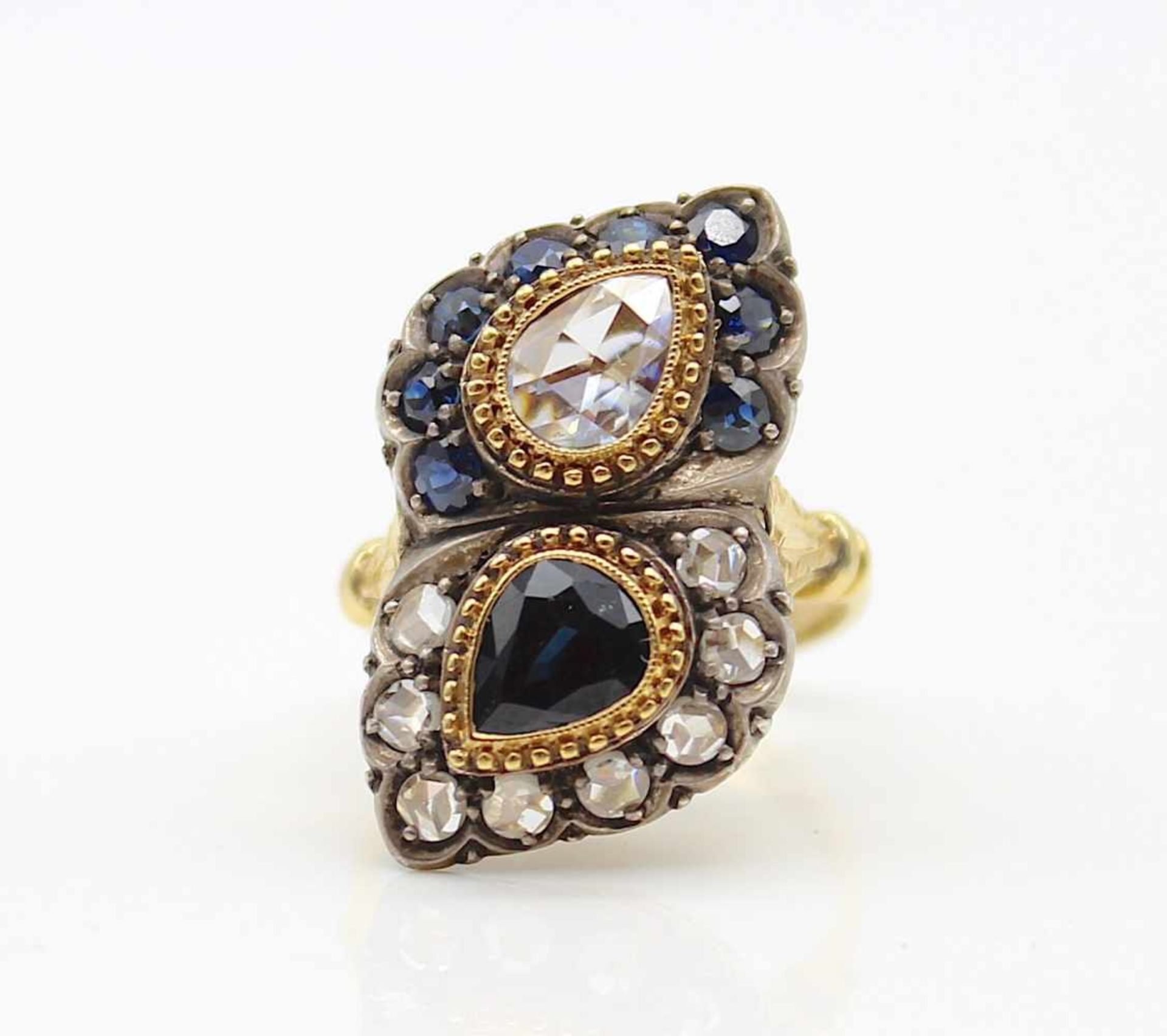 Ring made of 750 gold with 9 sapphires, total approx. 2.6 ct and 8 rose-cut diamonds, total