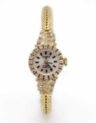 Ladies' wristwatch lever hand winding 585 gold with 32 brilliants, total approx. 0.35 ct in high
