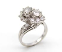 Ring in 18 ct white gold with 20 brilliants.2 diamonds á 0.52 and 0.65 ct, SI 1-2 colour H - I and