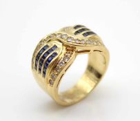 Ring in 750 gold with 32 sapphires, total approx. 0.65 ct and 29 brilliants, total approx. 0.50 ct