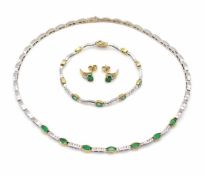 Jewellery set consisting of necklace, bracelet and earrings. Material 750 white and yellow gold with