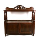 A Victorian oak two-tier buffet on turned supports with a cupboard beneath.