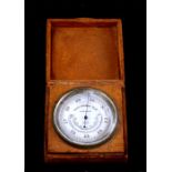 An Asprey pigskin cased combination compensated barometer, altimeter and thermometer, marked