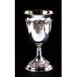 A 900 grade silver goblet with gilt interior, decorated to both base and bowl with applied grapes
