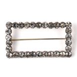 A Georgian silver and paste rectangular brooch, probably a converted buckle. 6.2 by 3.4cm (2.5 by