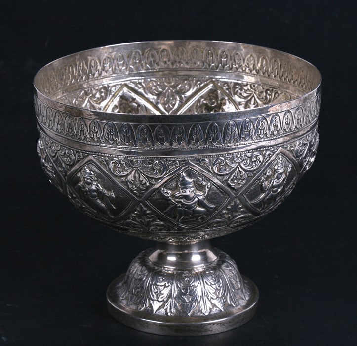 A late 19th / early 20th century Indian white metal (test as silver) pedestal bowl embossed with